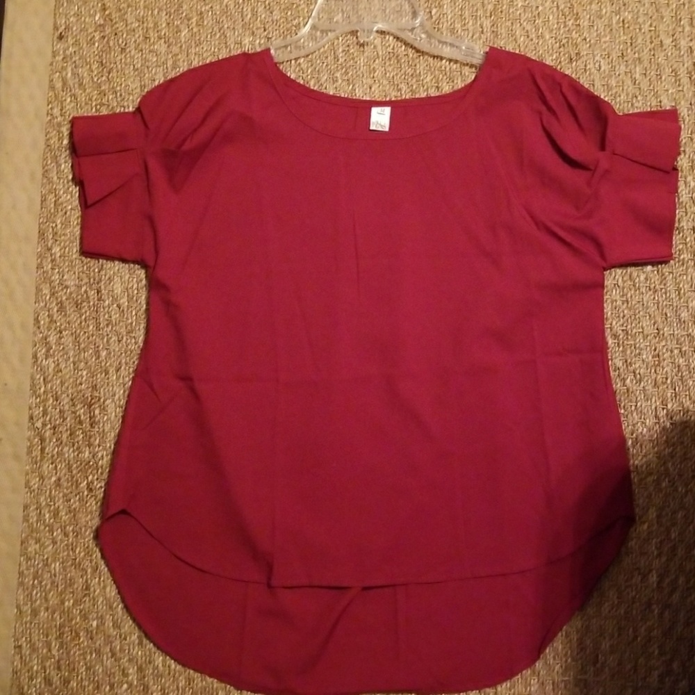 NWOT lightweight burgundy blouse with pleat sleeve